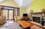 Large stone fireplace is the focus of the room